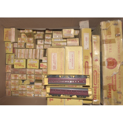 32 - Triang Railways, TT table-top gauge, two boxed train sets: TCX and T2, with a large quantity of coac... 