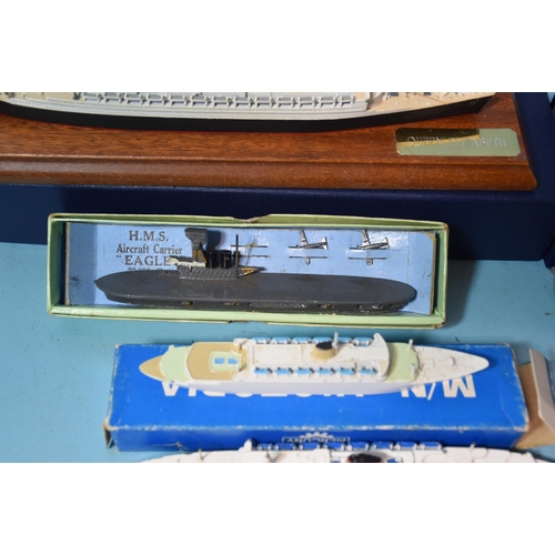 Three scratch-built waterline models of liners and one battleship ...