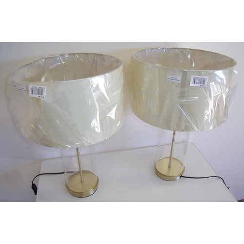 18 - Pair of brand new ex-shop stock table lamps with clear glass bodies