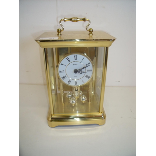 31 - Modern gilt cased Bentima German made mantel clock (28cm high)