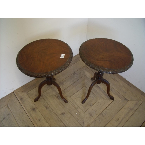 388 - Pair of mahogany circular top wine tables with carved column and three out-splayed supports (diamete... 