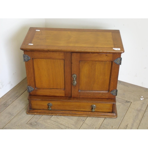 4 - Early - mid 20th C table cabinet with two panelled cupboard doors above singe drawer on stepped base... 