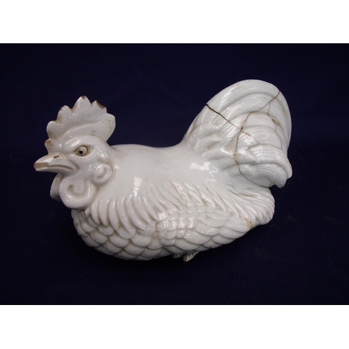 19a - Unusual Blanc de Chine porcelain figure of a seated cockerel with multi-digit signature panel to the... 