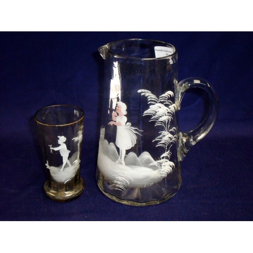 20 - Mary Gregory style hand painted water jug with loop handle and similar tinted glass beaker (2)