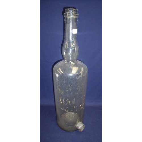 23 - Large Single Scotch `The Uam Var' Dispensing Bottle with transfer printed detail and tap port to the... 