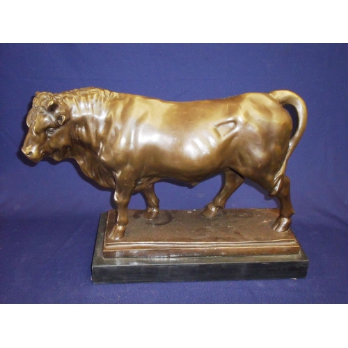48 - Large bronze figure of a bull on rectangular marble base (48cm x 19cm x 34cm)
