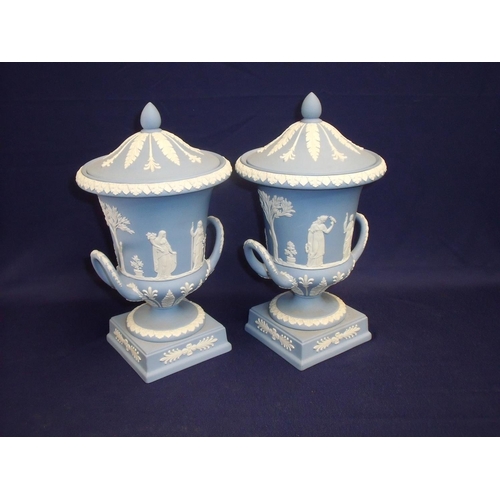 5 - Pair of Wedgewood blue Jasperware urn shaped garnitures with lift off covers, decorated with classic... 