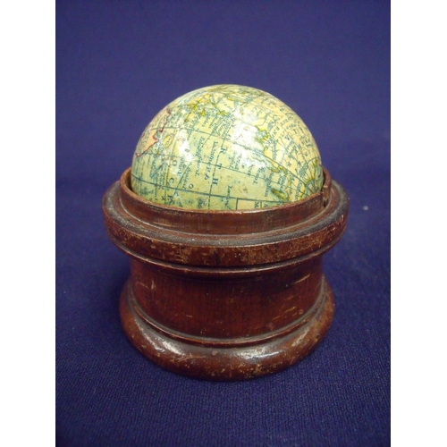 56 - Late 19th C pocket sized desk top terrestrial globe by Malby & Sons London 1877, set within turned o... 