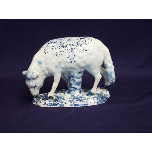 8 - 19th C continental tin glazed blue & white figure of a sheep with floral detail, the base marked A I... 