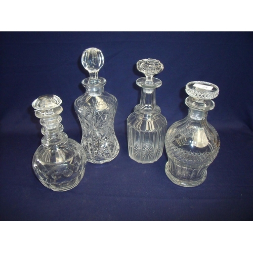 51 - Group of four various quality cut glass decanters of various forms