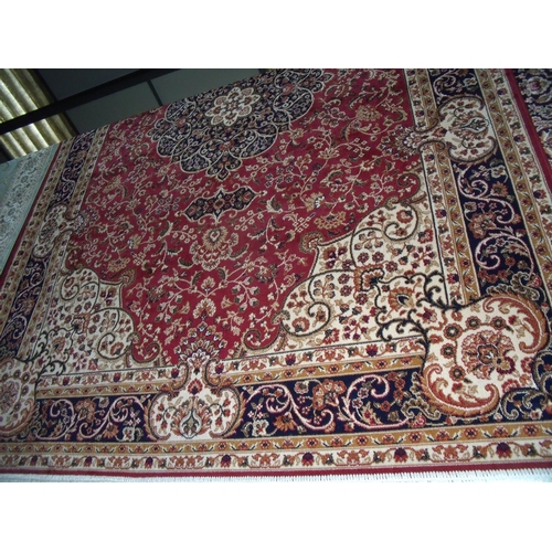 389 - Red ground Keshan carpet (230cm x 160cm)