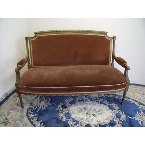 390 - Victorian gilt framed sofa with upholstered seat, back and arms on fluted supports (width 150cm)