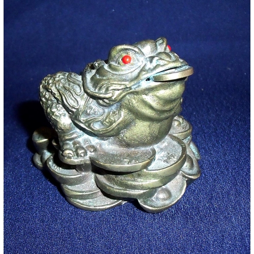 1 - Small early to mid 20th C Chinese bronze figure of a toad with coin in its mouth seated upon a pile ... 