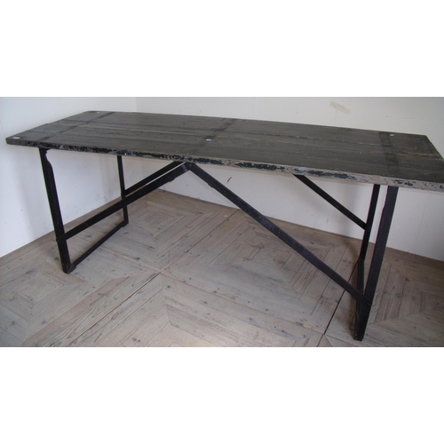 101 - Large painted plank top trestle table with folding metal base (213cm x 76cm x 84cm)