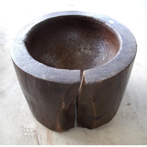 102 - Large hollowed out elm style tree truck bowl/mortar with inset carrying handles to the sides and dee... 