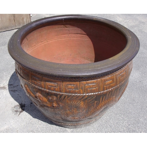 104 - Large terracotta style circular planter decorated with Greek detail and dragons (diameter 70cm, heig... 