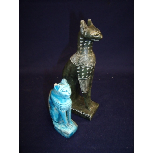 151 - Carved stone Nephrite Cat (18.5cm high)and another similar blue glazed pottery example (11.5cm high)