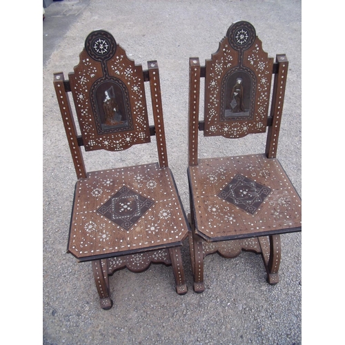 159 - Pair of 19th C Italian X shaped hall chairs with inlaid detail and central panel to the back depicti... 