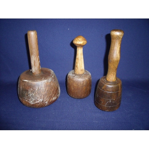 16 - Three 19th/20th C Masons mallets of various sizes and designs, one stamped DN33ILL (approx. 24cm hig... 