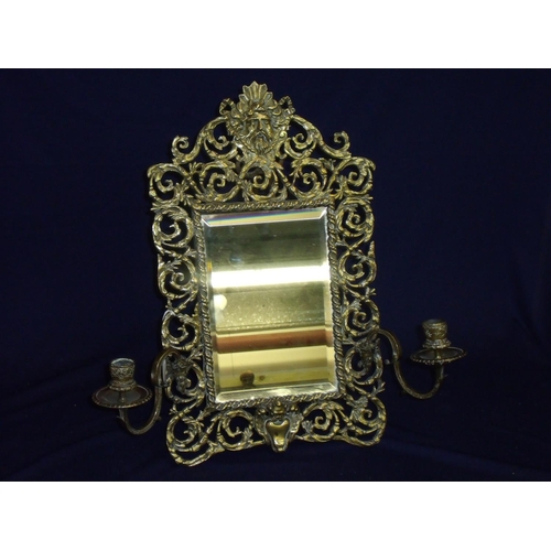 163 - 19th C Brass easel bevelled edged table mirror with fretwork surround and twin folding candle sconce... 