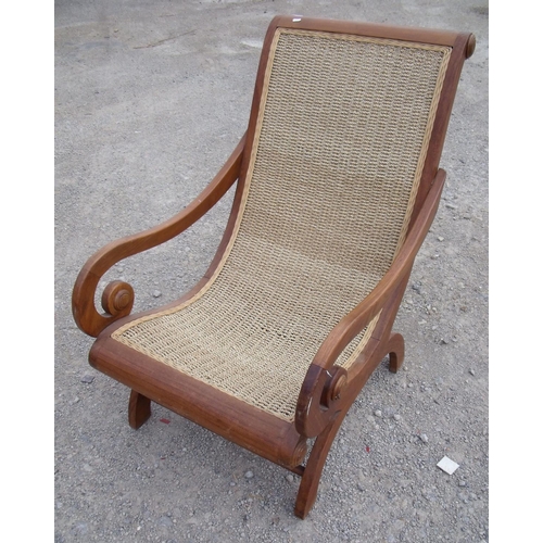 167 - Teak framed rattan work Indian plantation style wide seated lounger