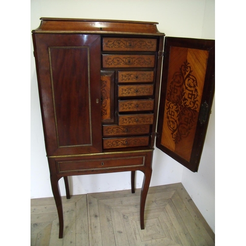 192 - 18th/19th C continental walnut cabinet with hinged top above two panelled cupboard doors revealing f... 