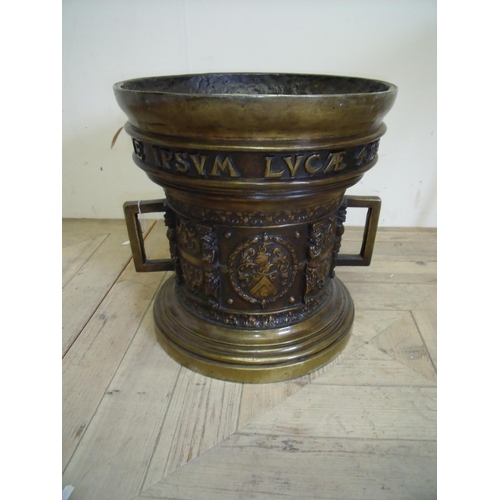 193 - Large 16th C design bronze two handle medicine mortar cast with armorial crest, figures and swags wi... 