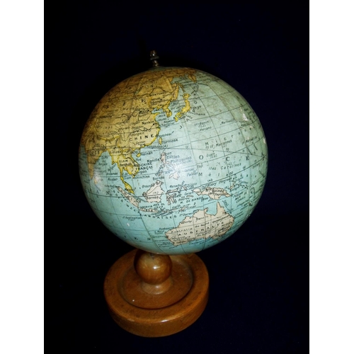 2 - G. Thomas of Paris terrestrial desk globe on turned wood stand (overall height approx. 23cm)