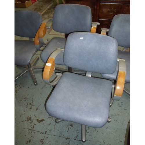 55 - Set of four unusual circa 1970's swivel office style armchairs with part metal and wood arms with up... 