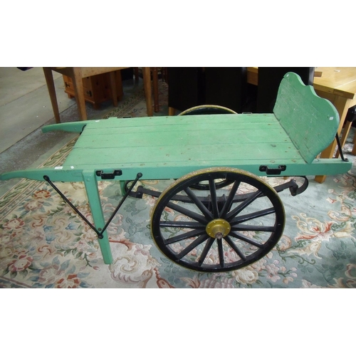 56 - Early to mid 20th C market traders style flatbed handcart with twin sprung axle carriage wheels