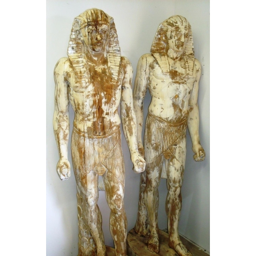 65 - An unusual and scarce pair of 19th/20th C carved pine wood life sized Egyptian figures with minor tr... 