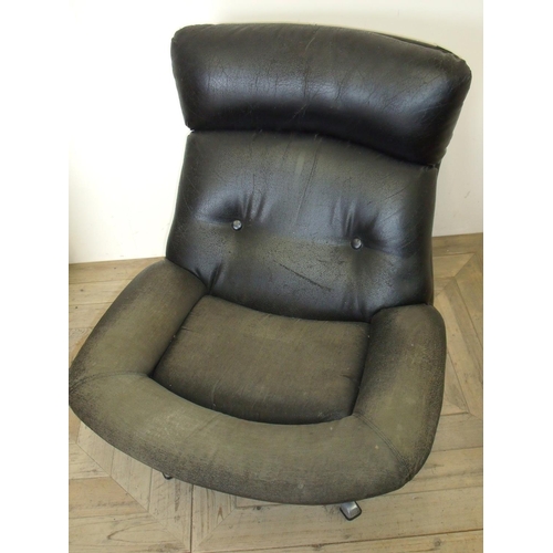 69 - Retro style low seated swivel lounge chair