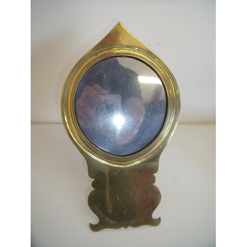 112 - Late 19th C brass framed mirror with easel stand (28cm high)