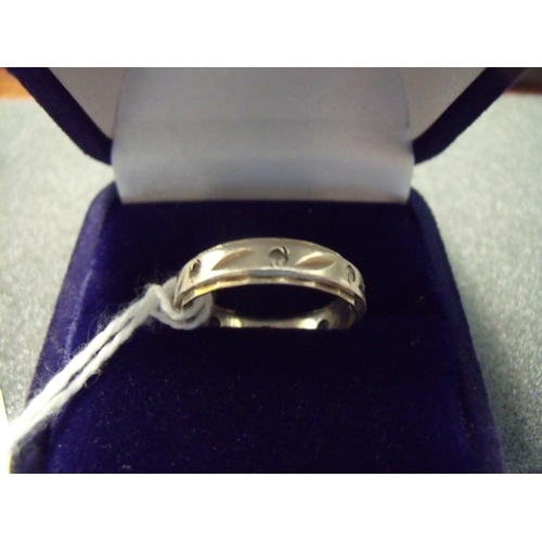 29 - 9ct gold and silver band set with white stones