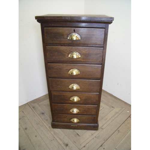 375 - Early 20th C mahogany chest of seven drawers with brass office style handles (50cm x 35cm x 106cm)