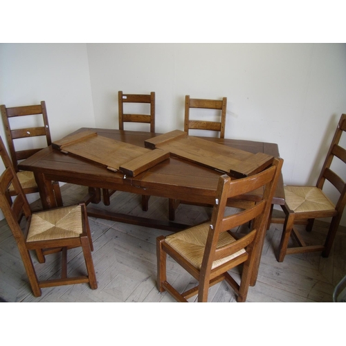 391 - Quality modern oak rectangular extending dining table and a set of six ladder back dining chairs wit... 