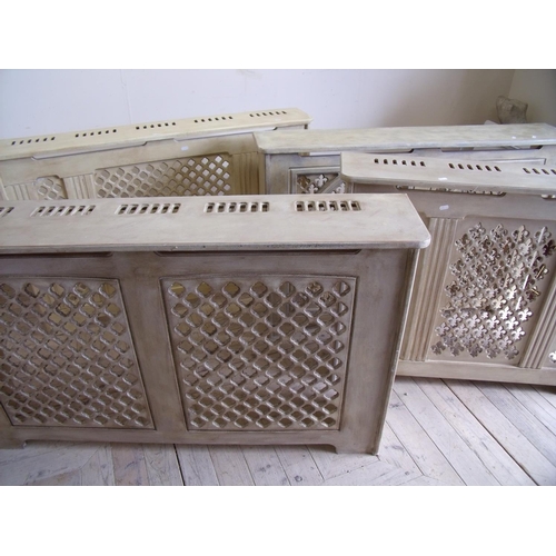 403 - Set of four painted wooden fretwork Gothic style radiator covers (width of largest cover 136cm, smal... 