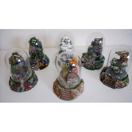 63 - Collection of thirteen limited edition Cottage Glass dome figures