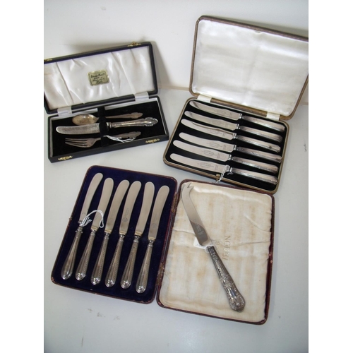 79 - Cased silver three piece cutlery set, silver handled cheese knife and two sets of cased  silver hall... 