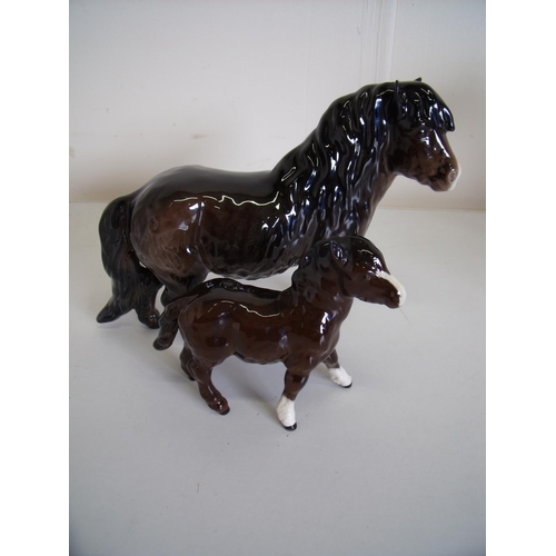 95 - Beswick figure of a Shetland Pony (Wally 1033) and a Shetland foal 1034 (2)