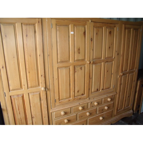 411 - Modern quality extremely large combination wardrobe with two central panelled cupboard doors above n... 