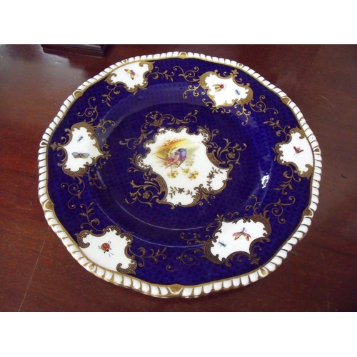 33 - Coalport blue & gilt cabinet plate with central panel of a bird within blue background, the plate wi... 