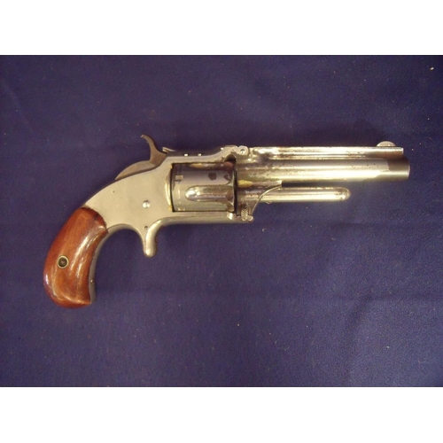 117 - Smith & Wesson .32 rim-fire revolver circa 1873. serial no. 107846, with top lever opening and two p... 