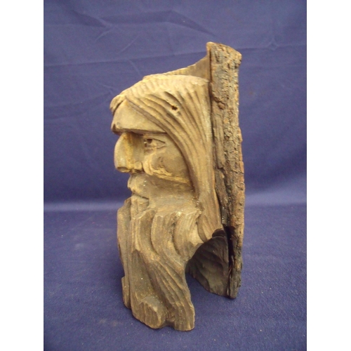 38 - Early French style carved wood figure of a bearded man carved from a tree branch retaining bark to t... 