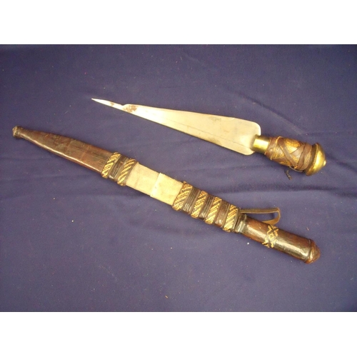 40 - African style tribal long bladed dagger with 13 inch blade, leather bound grip with inlaid woven det... 