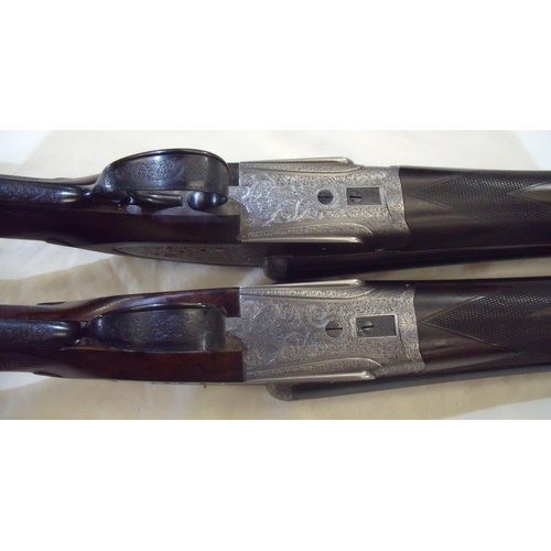 484 - Cased pair of William Evans single trigger 12 bore side-lock ejector shotguns with finest quality sc... 