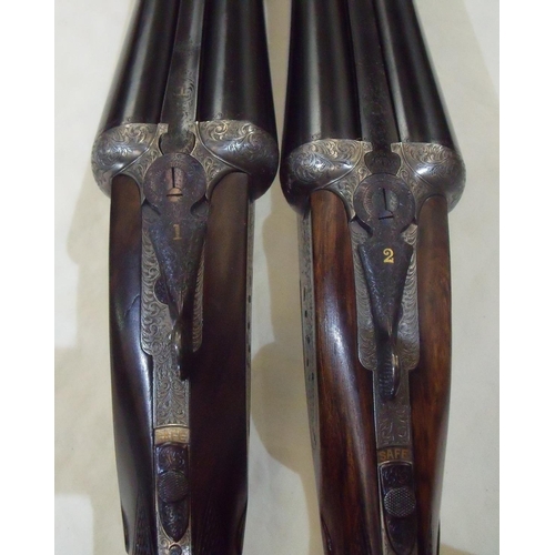 484 - Cased pair of William Evans single trigger 12 bore side-lock ejector shotguns with finest quality sc... 