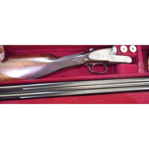 484 - Cased pair of William Evans single trigger 12 bore side-lock ejector shotguns with finest quality sc... 