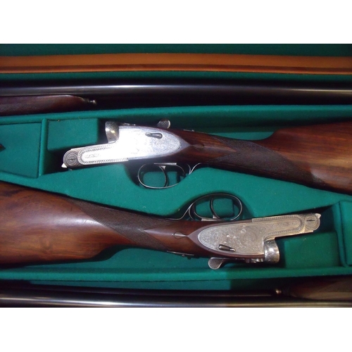 485 - Cased match pair of black Sabel 12 bore side by side side-lock ejector shotguns, with 27 inch barrel... 