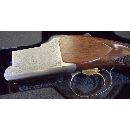 488 - Cased Browning Sport 12 bore over & under ejector shotgun with 28 inch barrels, multi-chokes and sin... 